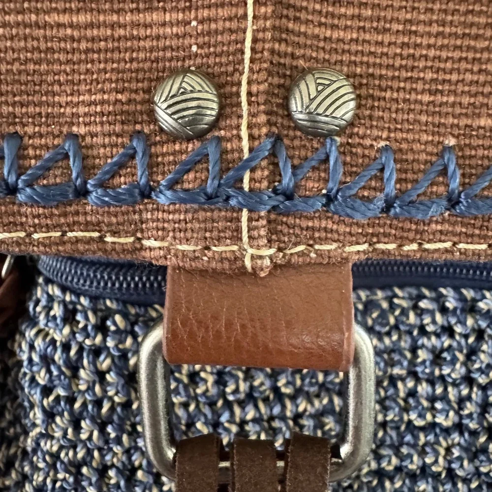 The Sak Brown & Navy Woven Backpack with Tassel Fringe and Embroidered Strap